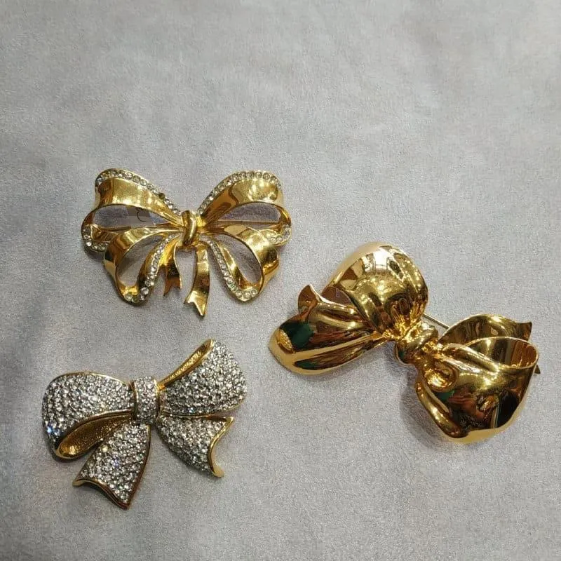 Vintage Swarovski bow brooch crystal gold plated