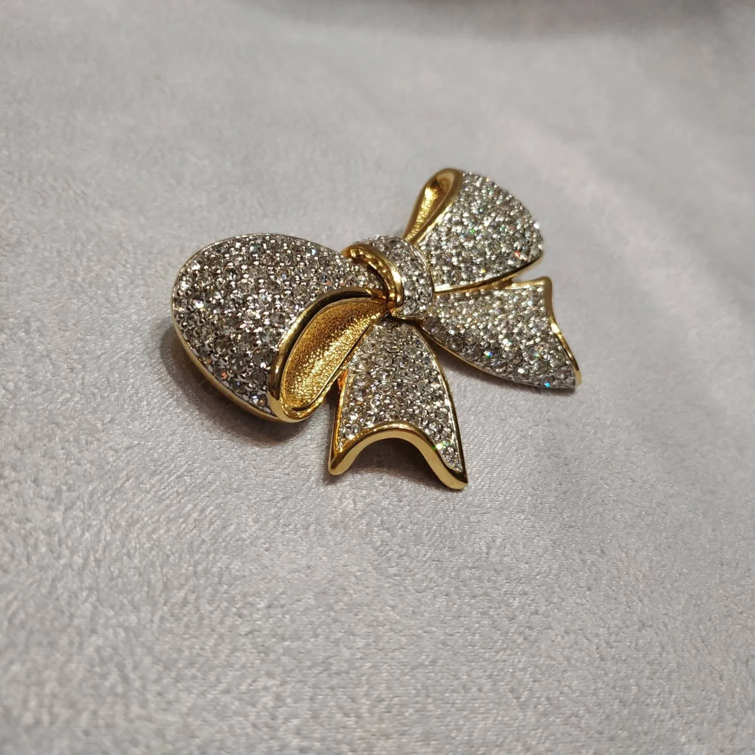 Vintage Swarovski bow brooch crystal gold plated